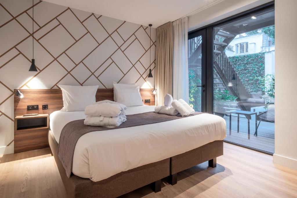 Chambre élégante et lumineuse au ONE TWO FOUR – Hotel & Spa à Gand, idéale pour un séjour romantique